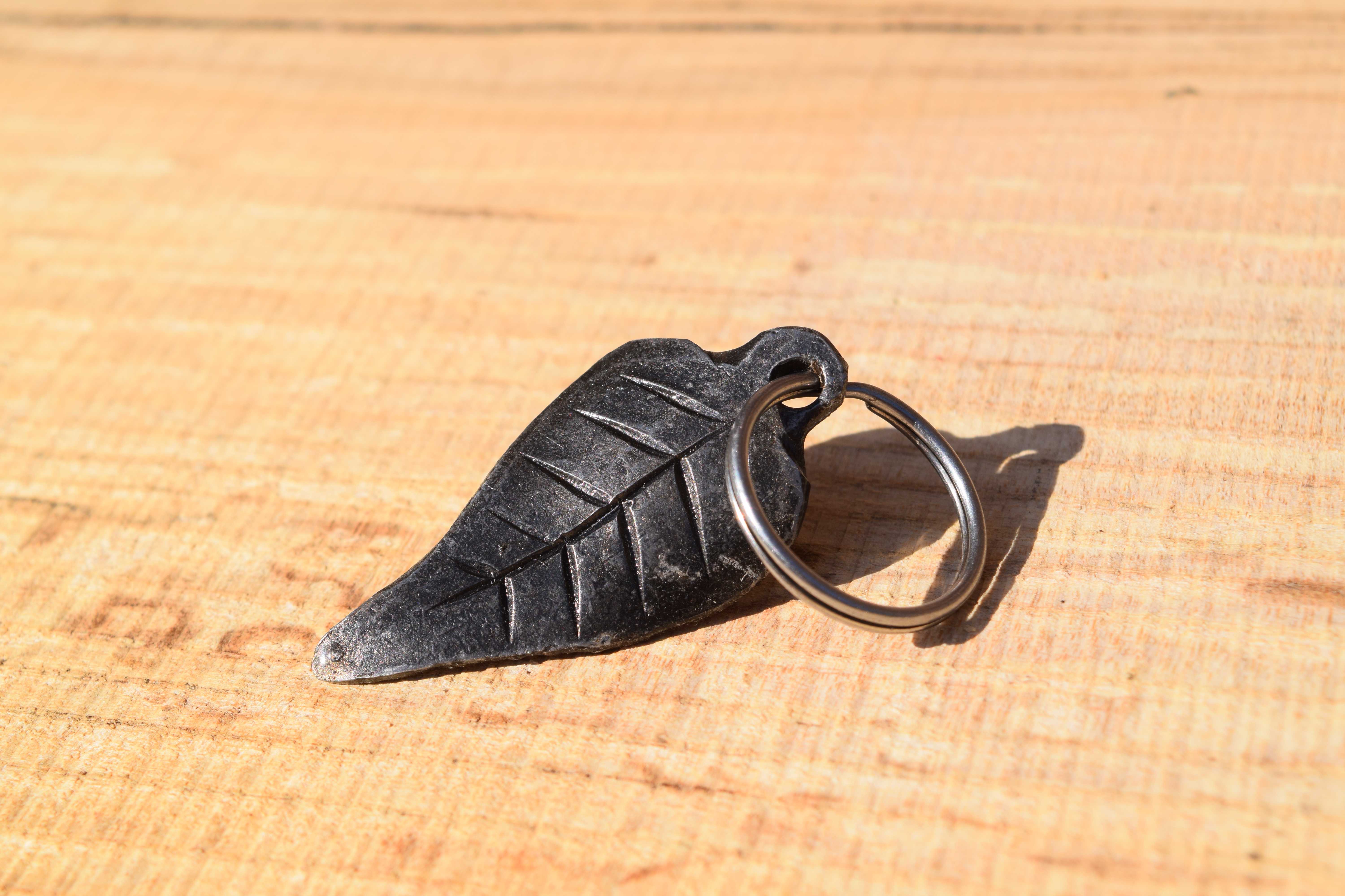 Handforged metal leaf keychain with detailed vein patterns